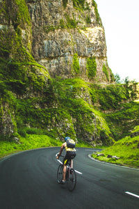 Biker enjoying a refreshing boost of energy with Suddenrush Guarana.
