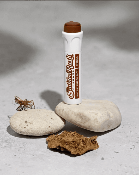 Brown Guarana Energy Shot by SuddenRush on Stone Surface